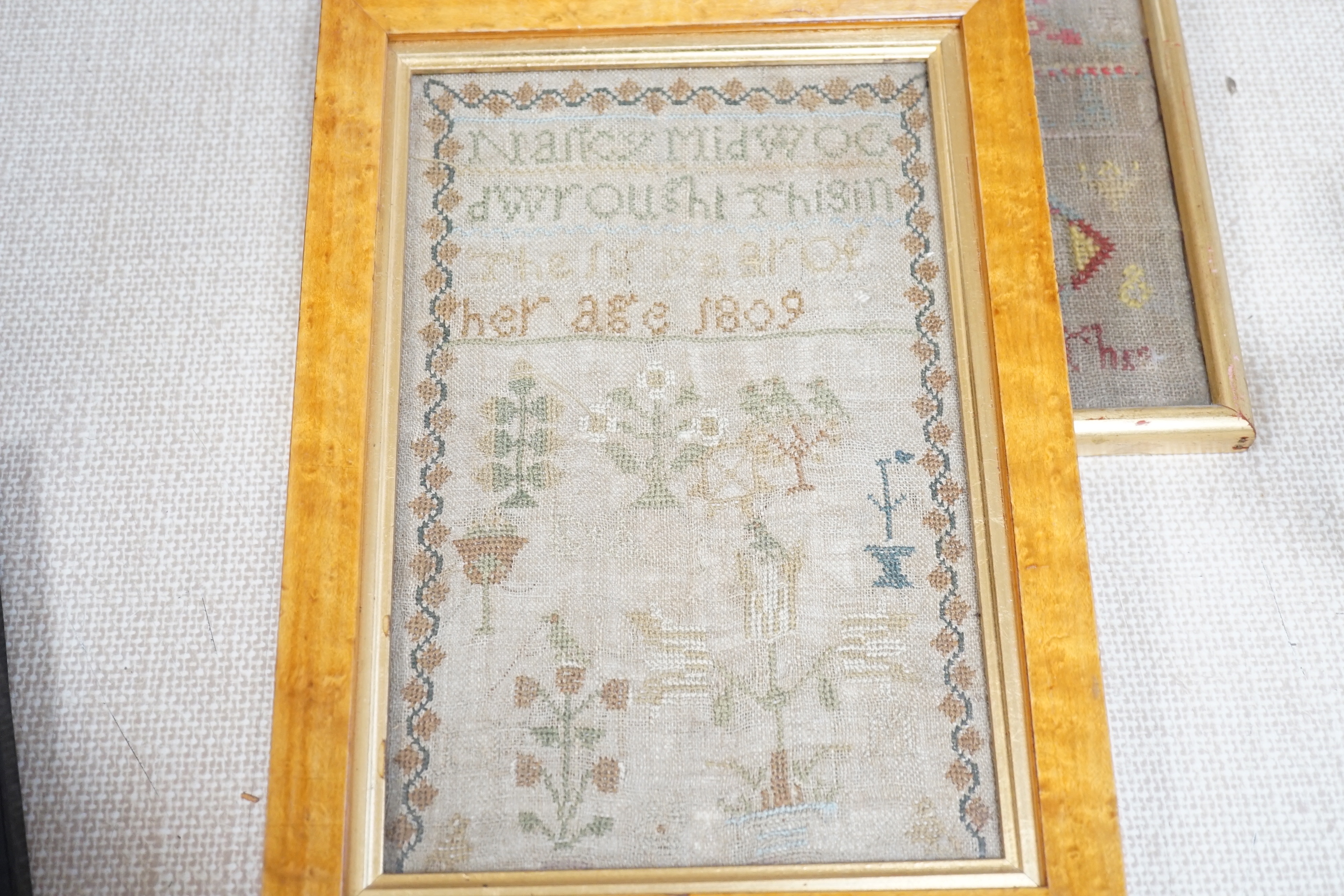 Five various Victorian needlework samplers, and another, 1927, largest 41cm wide x 46cm high